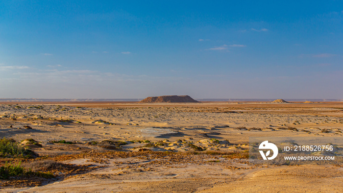 Isolated mountain in the middle of the desert in Morocco