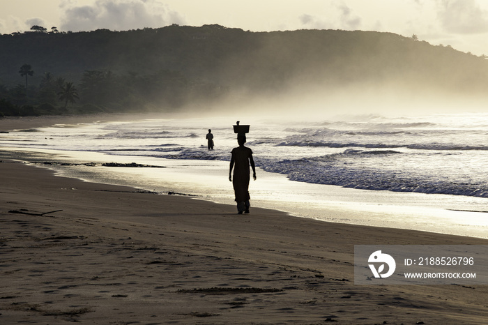 Woman on beach Ghana coast