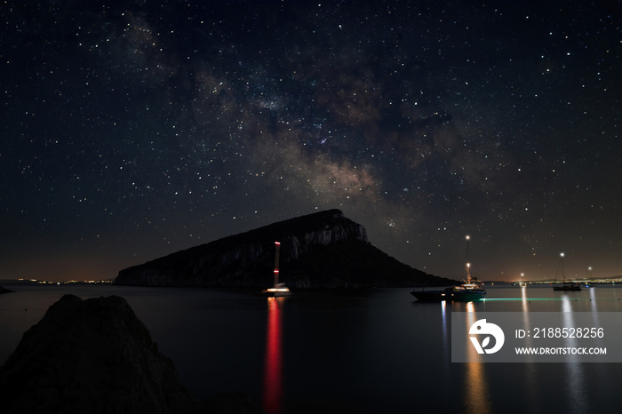 Panoramic night view of Cala Moresca, with a view of the Milky Way, Golfo Aranci, Olbia, Costa Smeralda - Sardinia