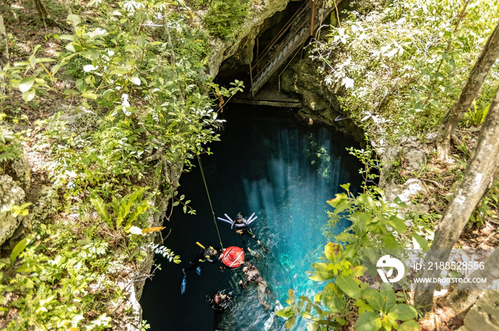 Cenote Pit top view, freediving session in the cenote of Mexico, Tulum, Mexico