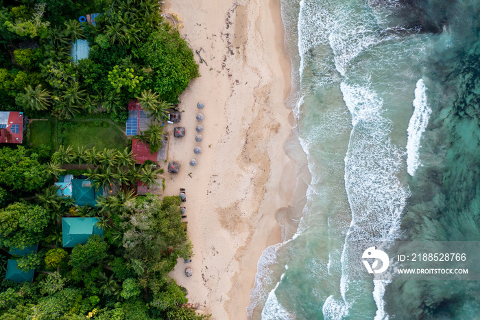 Tropical Island Aerial View. Wild coastline lush exotic green jungle. Red Frog Beach in Bastimentos Island, Bocas del Toro, Central America, Panama.