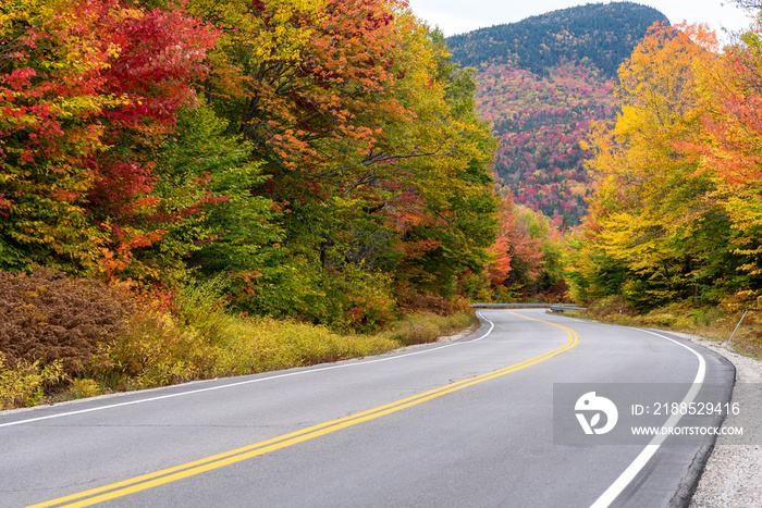 Stunning autumn colours along a winding mountain road. kancamagus highway, NH, USA.