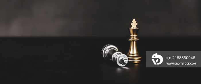 Close-up king chess standing on falling chess concepts of wining to challenge or battle fighting of business team and leadership strategy and organization risk management or team player.