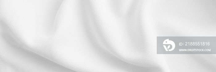 White wavy clothes background. fabric texture