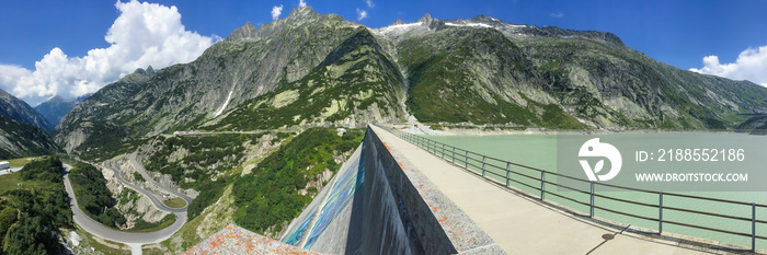 Dam and the reservoir on the way to Grimselpass