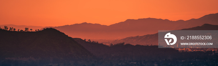 Sunset landscape view of silhouette mountains in Los Angeles California