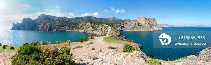 Wide panorama of the rocky sea coast from the cape