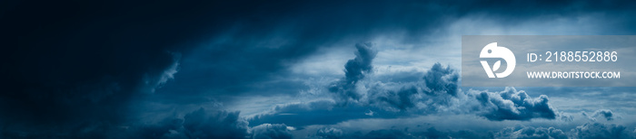 Dark sky with white clouds that make for a better or clear weather.