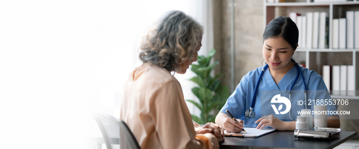 Asian female doctor examining a patient to assess the illness for proper treatment.