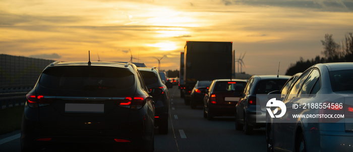 Highway traffic jam at sunset