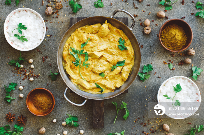 Curry with chicken in pan. Indian cuisine, top view