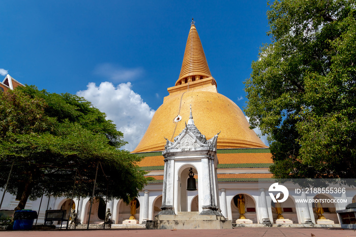 Phra Pathom Chedi with blue sky, The stupa is located in the Wat Phra Pathommachedi Ratcha Wora Maha Wihan, Buddhist temple in the town center of Mueang Nakhon Pathom District, Nakhon Pathom, Thailand