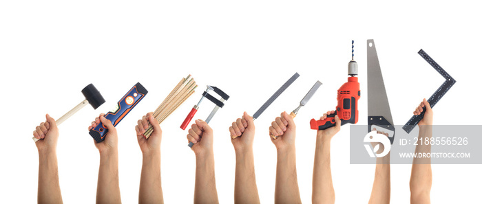 Hands holding tools on white background