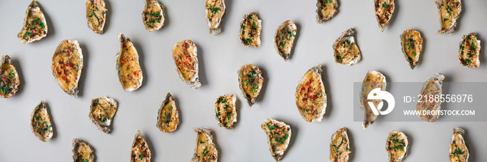 Tasty baked oysters on light background