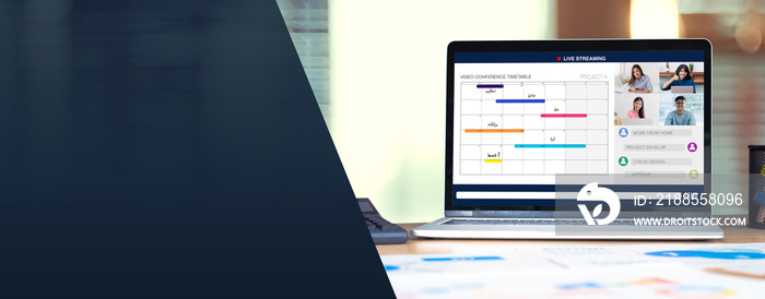 laptop show video conference with coworker team discussion about business chart market on desk at blur home background .banner for display of design.live streaming meeting.stay at home.home office