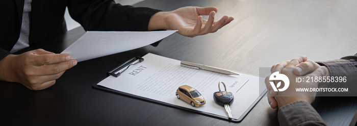 Car salesman offers prices and conditions for buying or renting a car to a customer, Entering into a car purchase-sale agreement with insurance, Way of business people conversation.