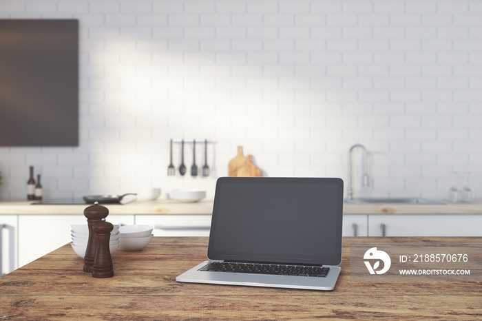 Empty laptop on kitchen counter