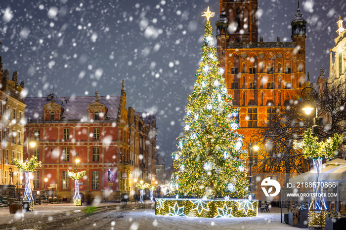 Beautiful Christmas tree in the old town of Gdansk at snowy night. Poland