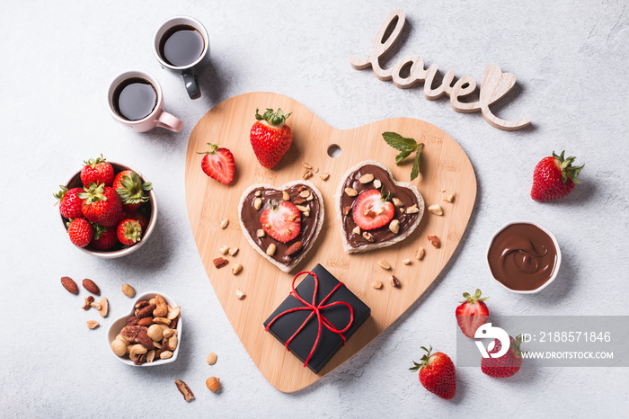 Breakfast for two, Valentines day food for couple in love with chocolate toasts and strawberry