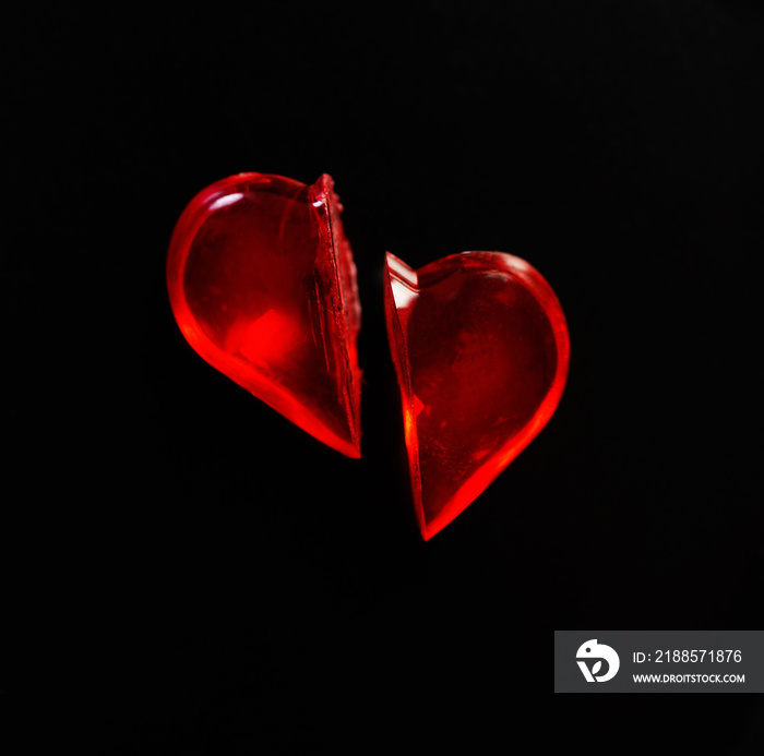 broken glass heart on black  background