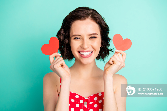 Photo of charming irresistible fascinating woman being definitely glad to have received paper cards 