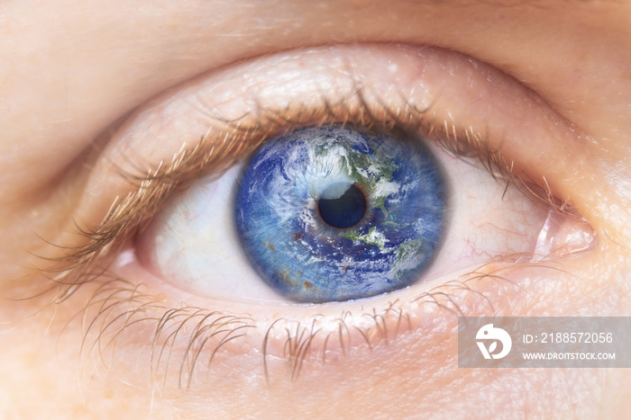 Environment conservation concept. Close up image of woman eye with earth in it. Creative composite o