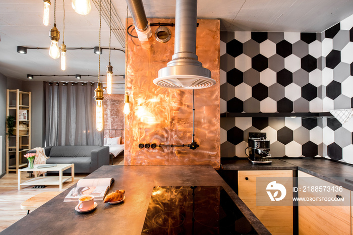 Modern loft kitchen room made in pink and grey colors with copper wall and hexagonal tiles