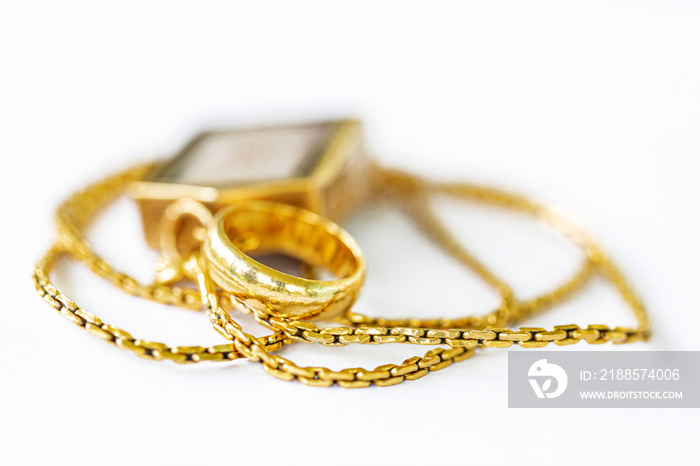 shiny gold and shiny gold Jewelry on table