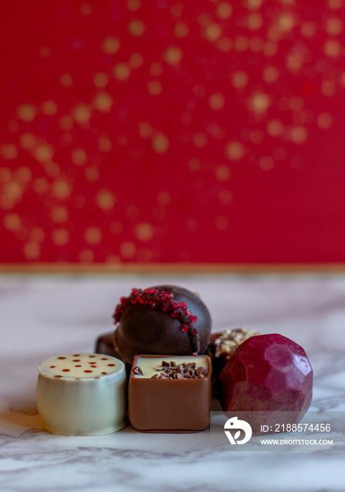 Holiday chocolate for Christmas, in fancy shapes with gourmet fillings