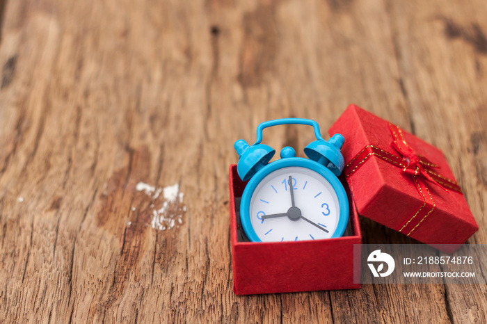 Clock blue in red gift box