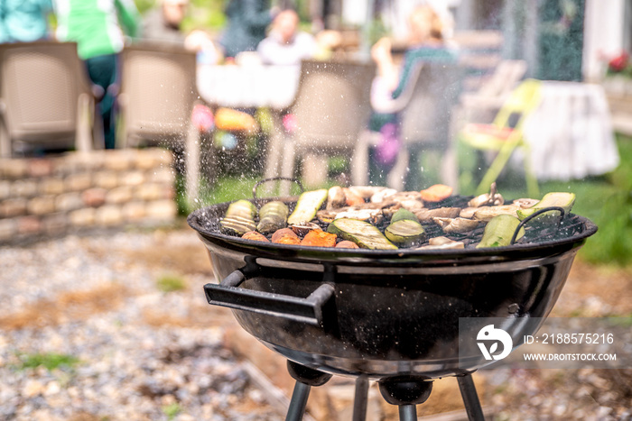 Simple round charcoal barbecue gril closeup.