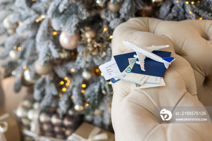 Christmas background with airplane. Travel concept for the holidays.