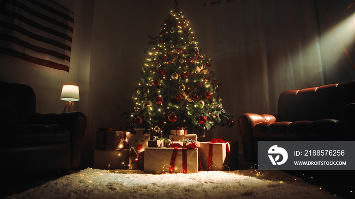 Christmas tree in a house with sofas and white carpet