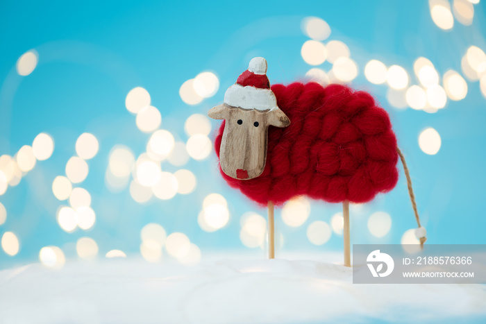 Sheep (lamb) toy background. Christmas greeting card. Christmas or New Year celebration concept. Cop