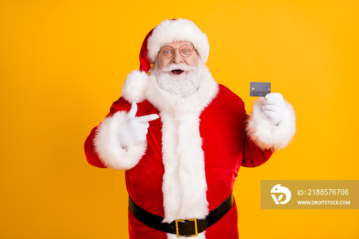 Photo excited grey white beard hair santa claus shopper point finger credit card recommend buy x-mas