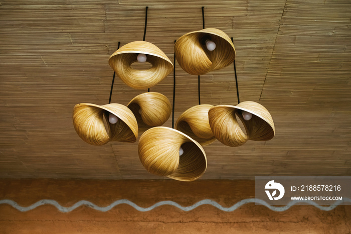 Contemporary wooden and eco-friendly furniture. Handmade chandelier, wood carving. Home interior dec