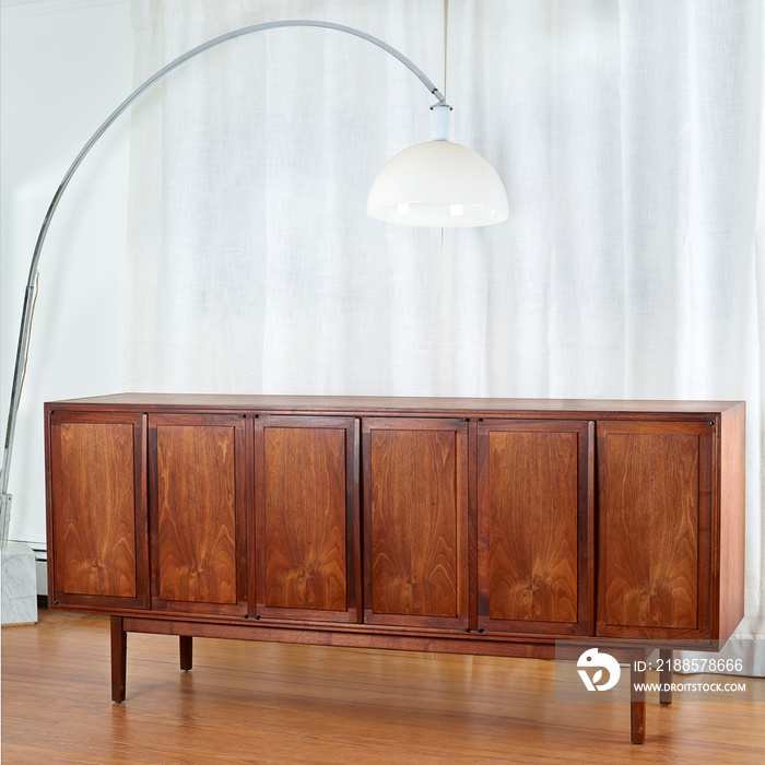 Mid-Century Modern Credenza.  Vintage storage cabinet. Interior view of wood hutch with futuristic l