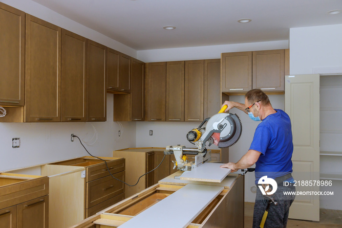 Worker protects himself from covid-19, man cut using circular saw rotating saw cutting wooden instal