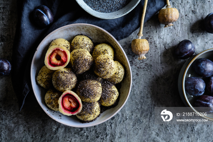 Sweet plum dumplings with poppy seeds