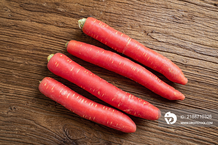 Slender red carrot