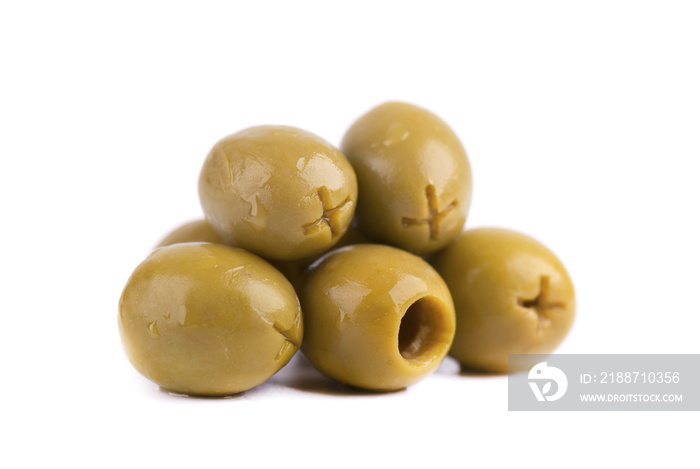 Pitted and marinated green olives, isolated on white background.