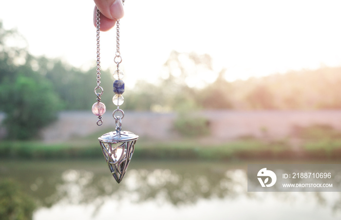 Foretelling the future with crystal pendulum.