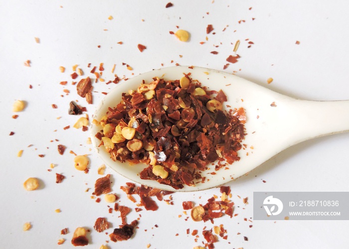 Spice - Crushed red pepper or red pepper flakes is a condiment consisting of dried and crushed (as opposed to ground) red chili peppers.