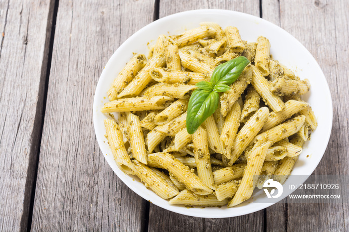 Italian penne pasta with sauce pesto