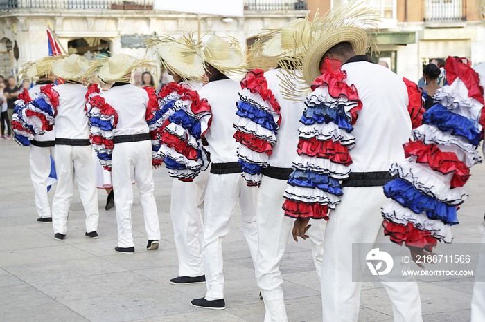 Dancers wearing one of the folk costume of Cuba ready to dance