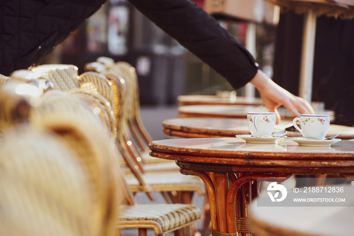 Two cups of espresso coffee on a coffee shop terrace from Paris, France.