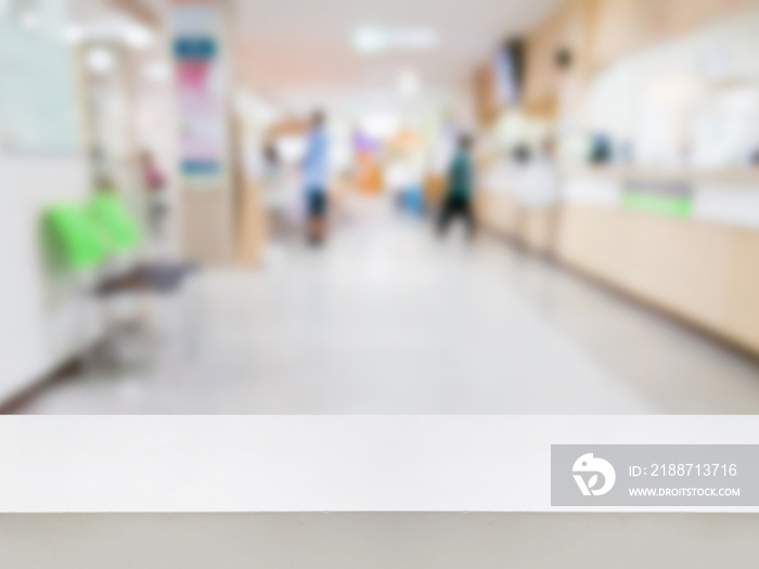 Empty white desk with blur hospital background