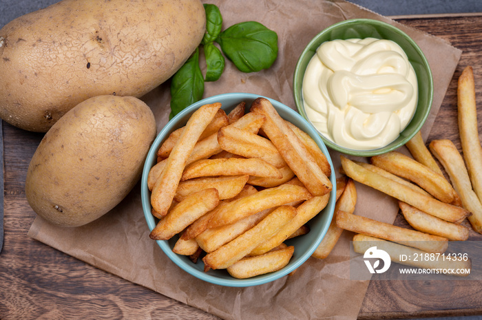 Bown with fresh cooked french fries potato chips with belgian mayonnaise sauce