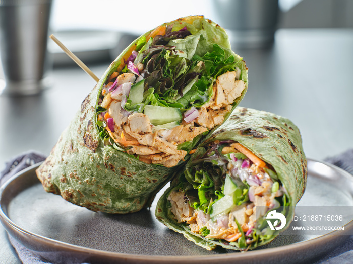 healthy green lettuce and chicken salad wrap