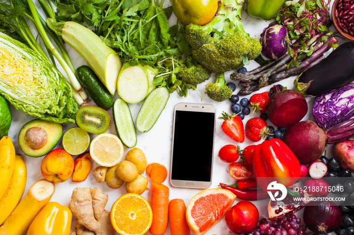 Top view of smartphone and fresh farm organic food